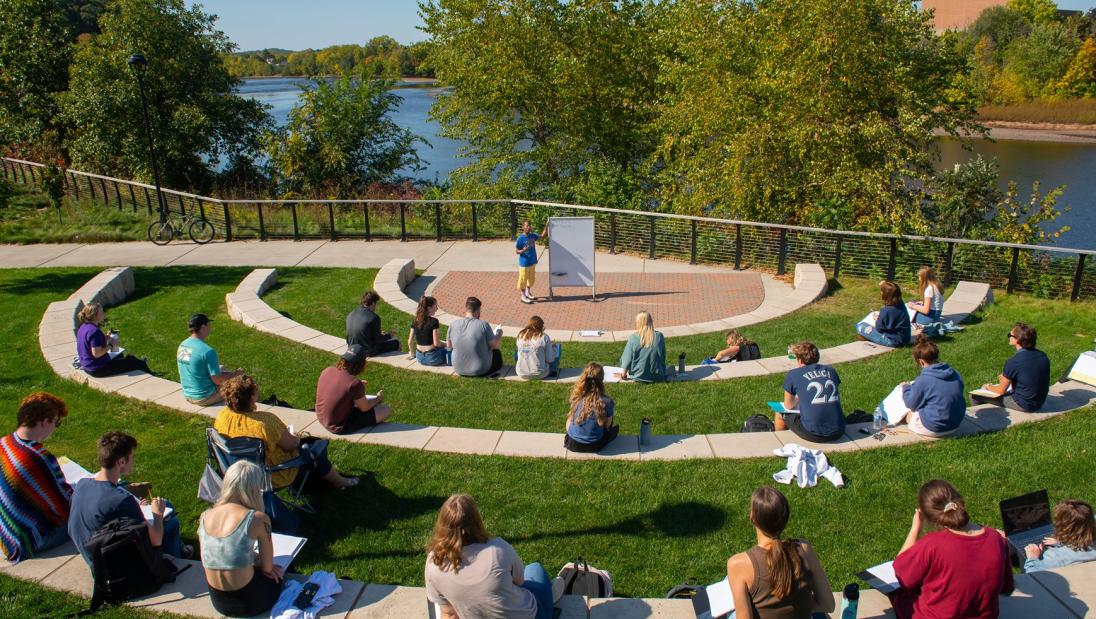 outdoor classroom full of students on a sunny day