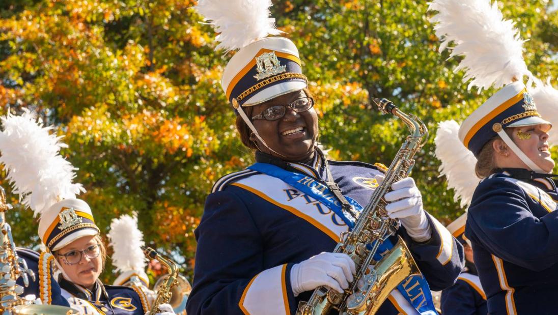 Blugold Marching Band member at Homecoming Parade