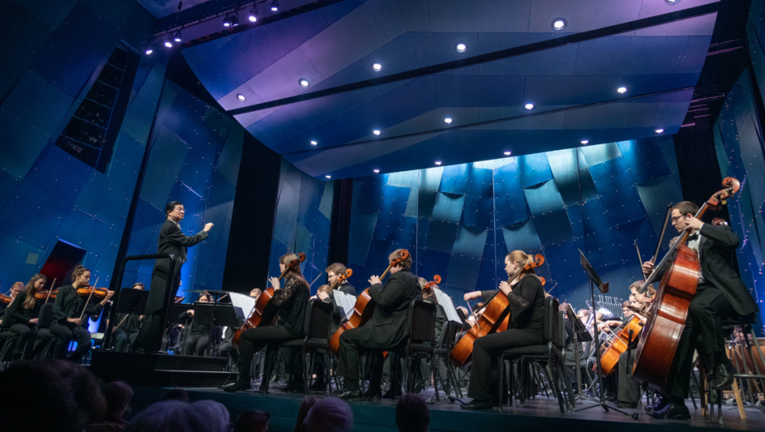 Nobuyoshi Yasuda conducts the University Symphony Orchestra in the RCU Theatre at Pablo Center
