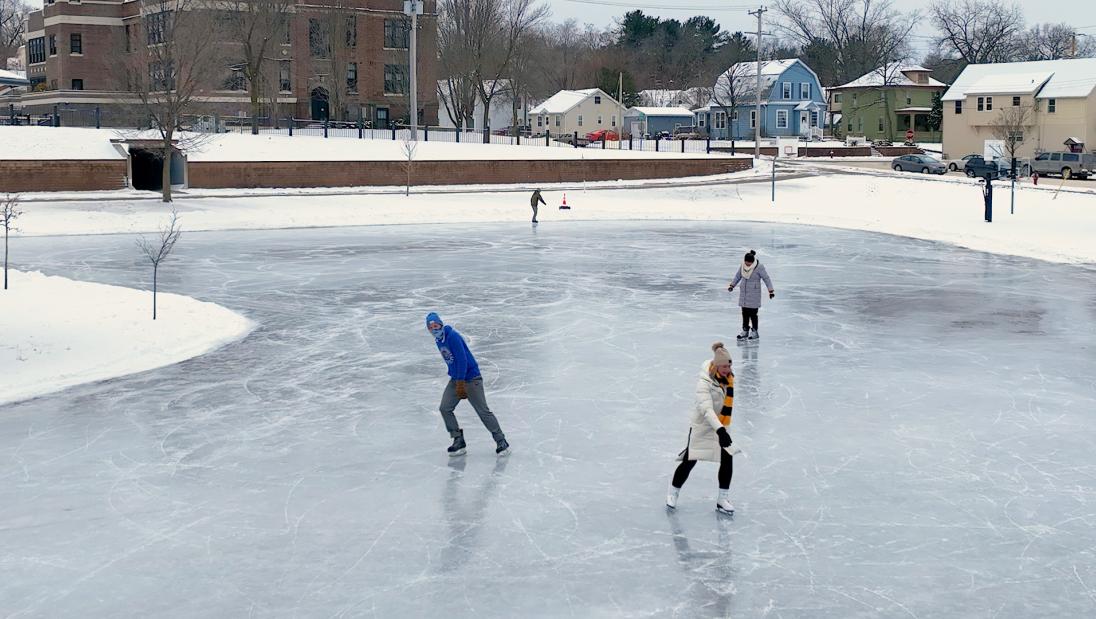 ice skating at outdoor city rink in Eau Claire