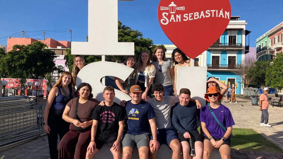 Group photo in front of the I heart PR sign in San Juan Puerto Rico