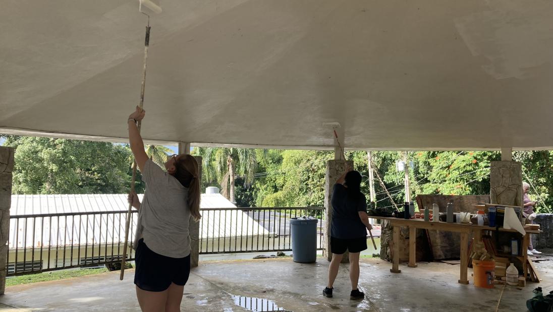 Students painting the ceiling of a shelter in Puerto Rico