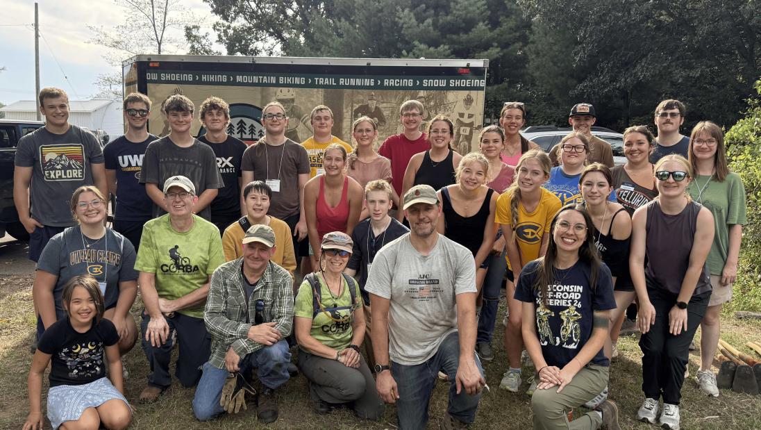 Students smiling after a hard day of trail maintenance with CORBA