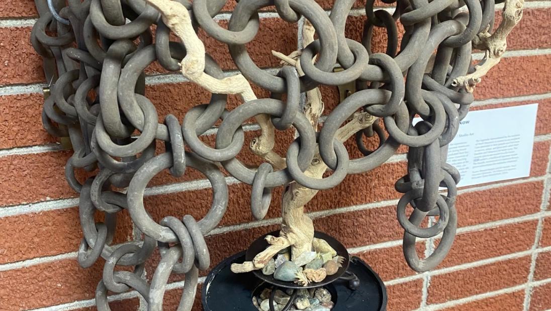 A closer look at student Deanna Schmalz' sculpture piece entitled "Never Again is Now"