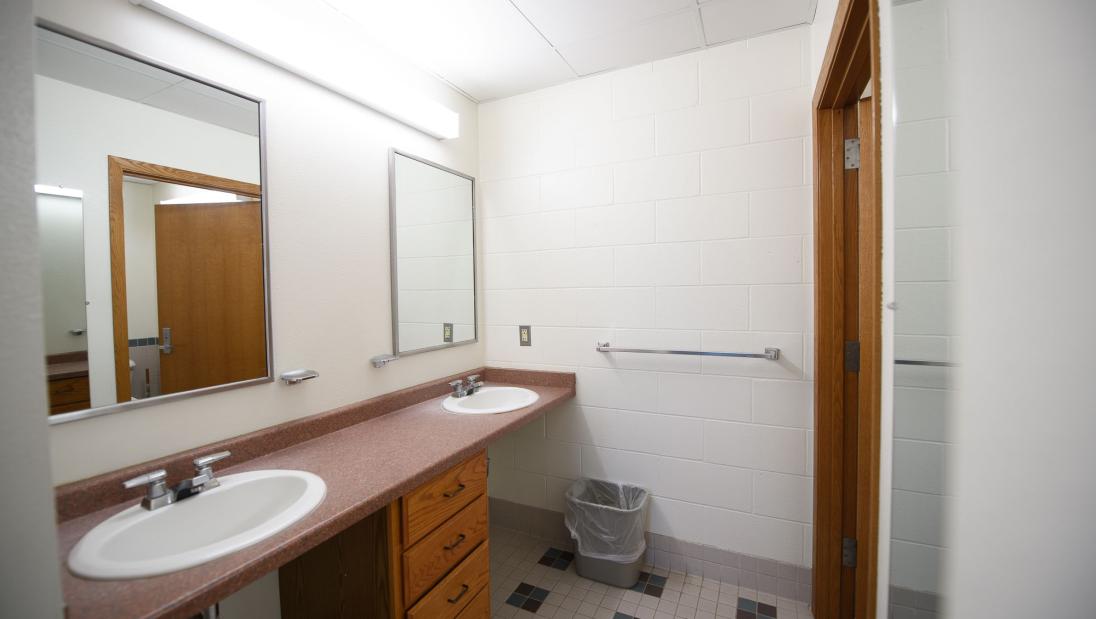 Two sinks in the bathroom area of a Chancellors Hall apartment.