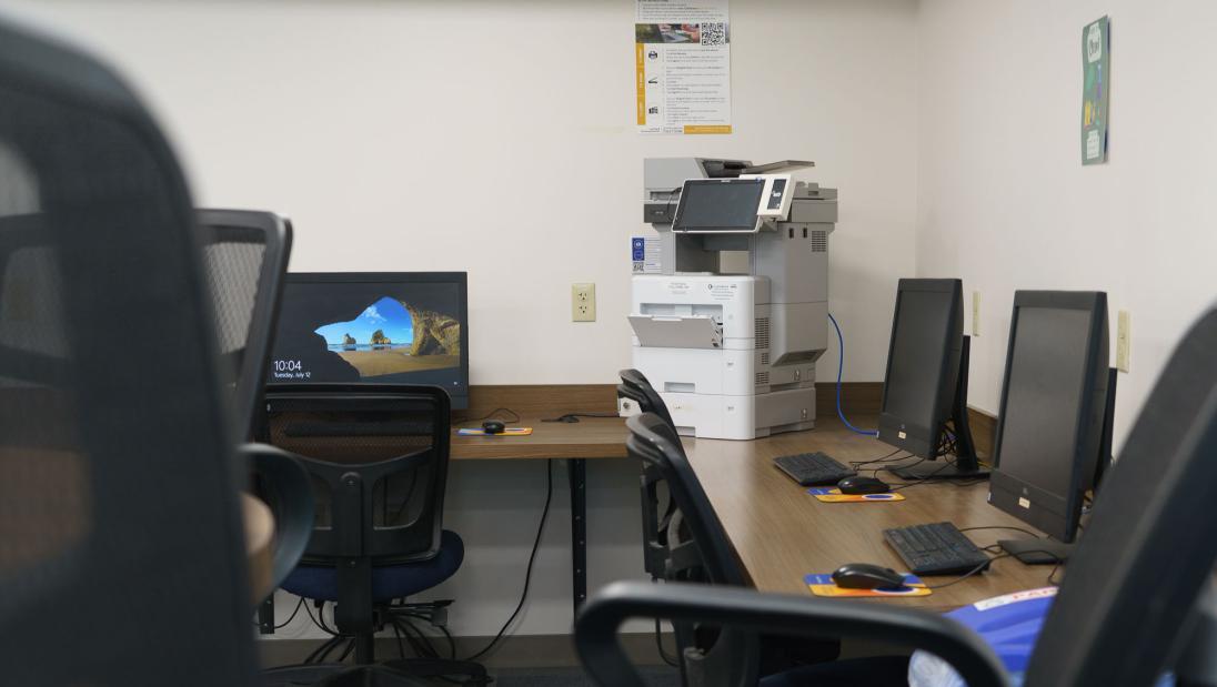 Computers in Towers Hall with printers.