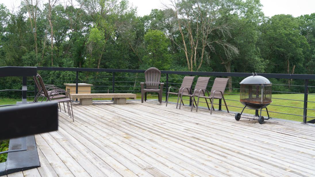 Nice outdoor deck space with seating for use at Priory Hall.