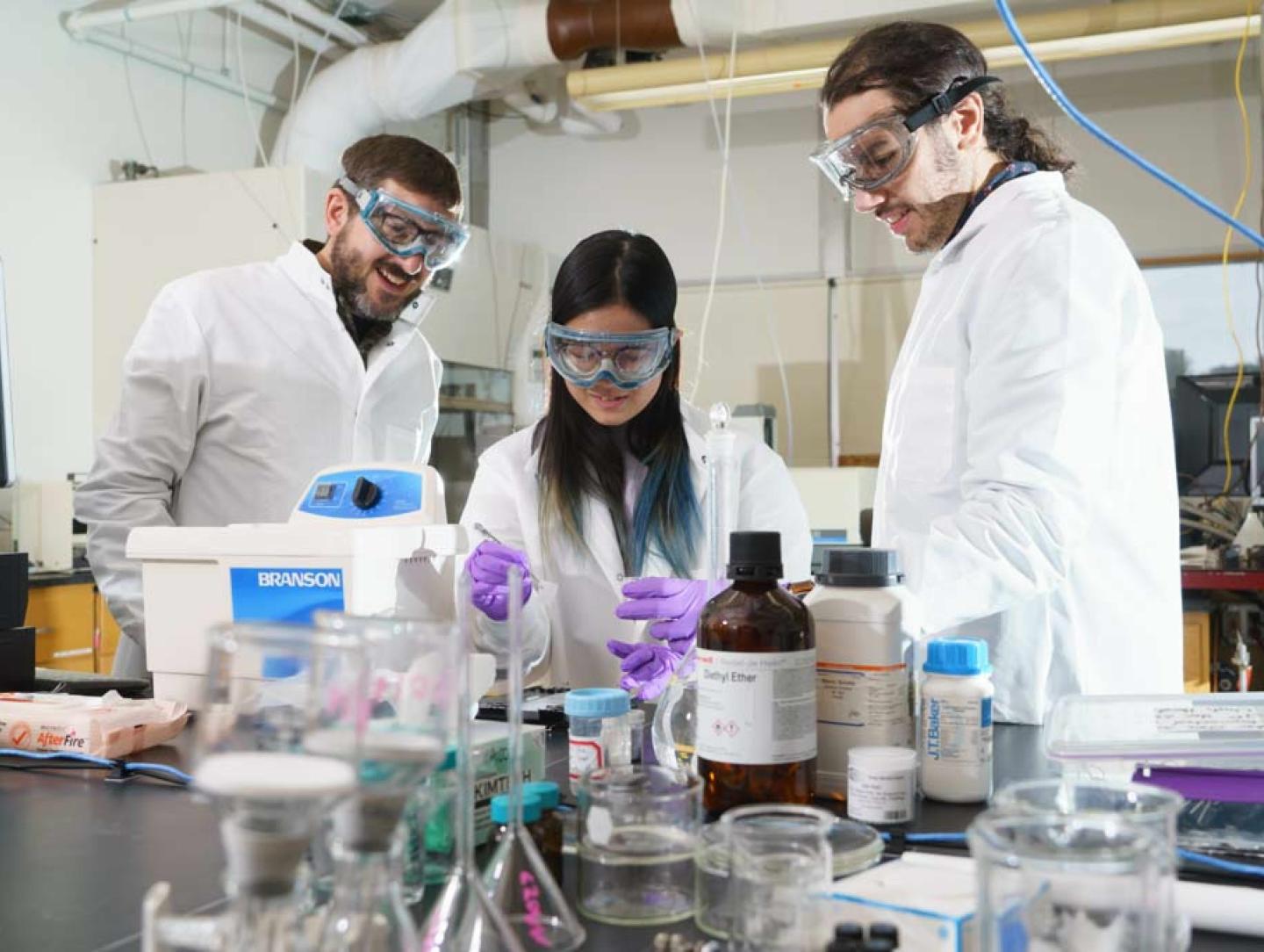 Students and Professor Working in Lab 