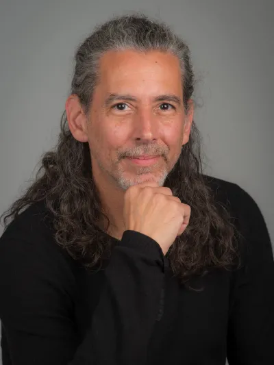 Professor Fernández looking at camera