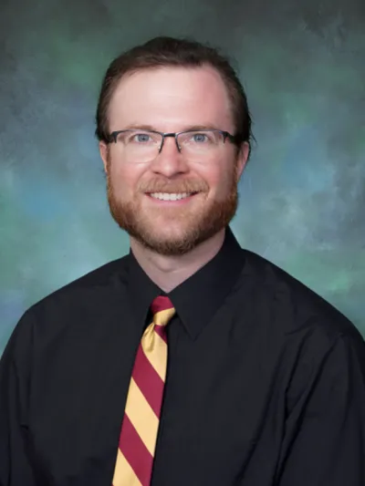Dr. Alex Craker headshot