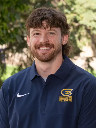 Staff Photo of Tristen Collins. Position: Outdoor Programs Manager at UW-Eau Claire.