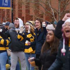 Students cheer on the runners at the end of the Eau Claire Marathon (The Blugold Mile) 