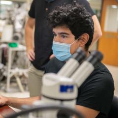 Materials science student working in a lab