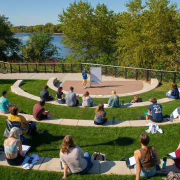 outdoor classroom full of students on a sunny day 