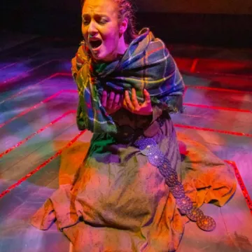 Student performing Macbeth