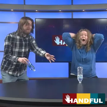 Two students perform a skit on Handful