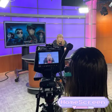 The host of HomeScreen presenting their next topic