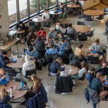 Full dining tables in Davies Student Center.