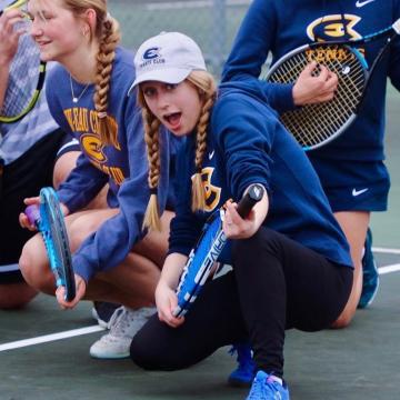 club tennis women silly pose with racquet