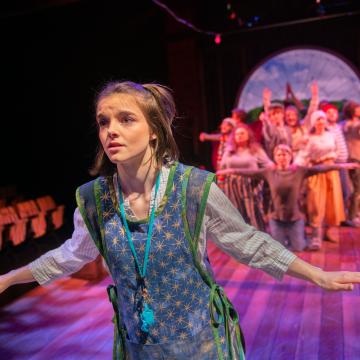students on stage in Starcatcher performance