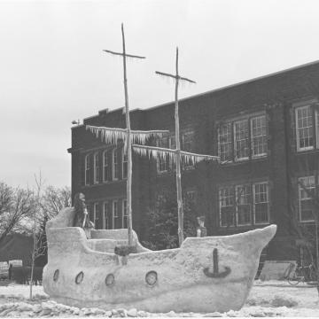 black and white image of snow sculpture outside Schofield Hall