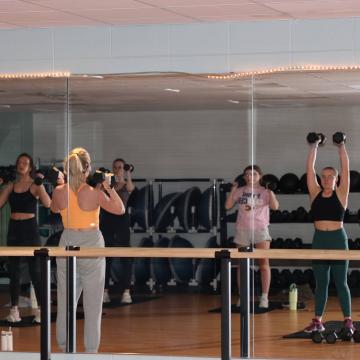 Group exercise HIIT class.