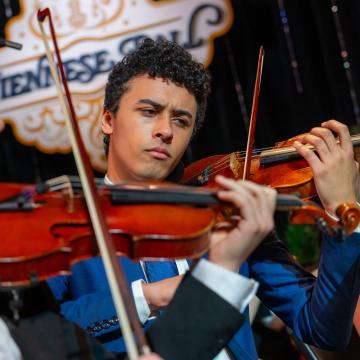 Viennese Ball 50th Anniversary violinists performing