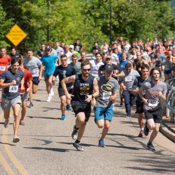 Students "Run The Hill", an annual tradition during TourDeRec.