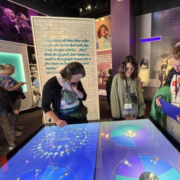 Students read and browse at a museum during the Civil Rights Pilgrimage.