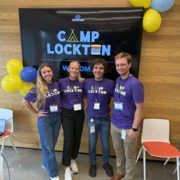 Hoffman and a group of Lockton interns pose for a photo