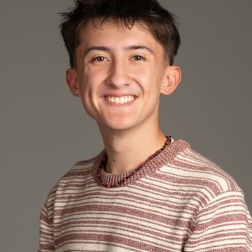 young man with short black hair