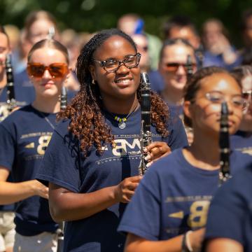 Blugold Marching Band members line up to perform.