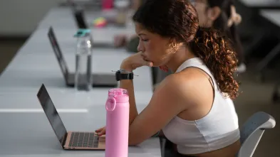 female student listening in class