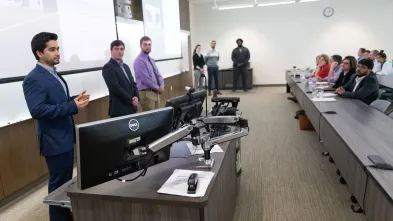 marketing students presenting to Mayo staff in COB 