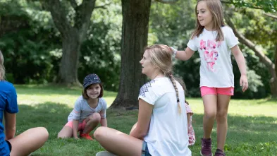 young kids exercise class outside 