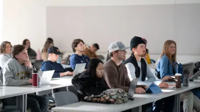 MGMT classroom, full rows of students