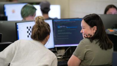 two students in computer lab