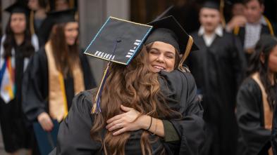 hugs on commencement day 2023