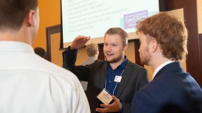 2023 COB alumni event folks chatting 