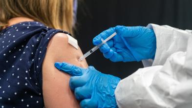 students working COVID  19 vaccine clinics 