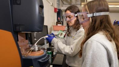 Foam lab research students using instrumentation
