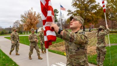ROTC students raising flags on campus mall for Veterans Day 