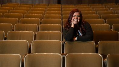 Heidi Joosten, music composition alumna in auditorium seats 