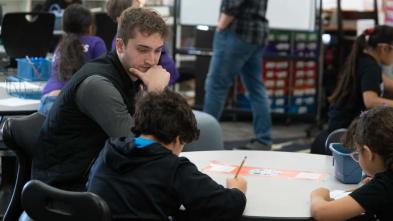 UW-Eau Claire student working in a school
