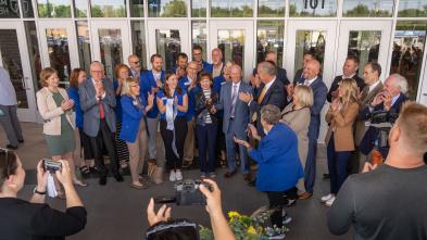 Sonnentag ribbon cutting group shot