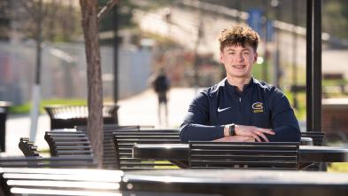 Charlie Mroz portrait outside Schofield Hall