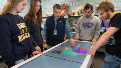 Mayo Health System medical professional, speech language therapist, Thomas Sather, discussed the human brain using Anatomage technology with honors students during an honors class.