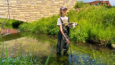 Field hydrology student in Little Niagara Creek 