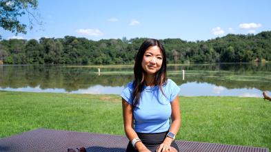 Jenny Anderson alumna outside near a lake, sunny day 