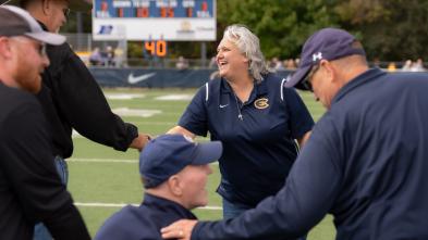 Clare Hohman shakes hands during Homecoming football game 2026